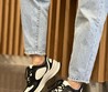 Женские кожаные кроссовки Gucci 2022-2023 черные с белым и фирменным принтом