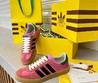 Женские кожаные кроссовки Gucci 2022-2023 розовые с черными полосами