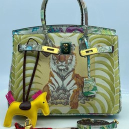 Женская кожаная сумка Hermes 2022-2023 желтая с принтом тигра 30х25