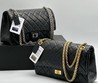 Женская кожаная сумка Chanel 2022-2023 черная с золотой цепочкой 28х16
