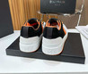 Мужские кожаные кроссовки Balmain 2022-2023 белые с черными замшевыми вставками и оранжевым