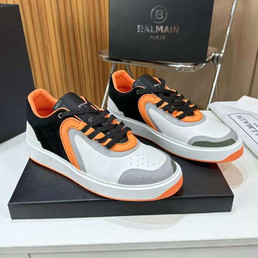 Мужские кожаные кроссовки Balmain 2022-2023 белые с черными замшевыми вставками и оранжевым