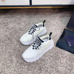 Женские текстильные кроссовки Prada 2022-2023 кремовые