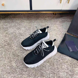 Женские текстильные кроссовки Prada 2022-2023 черные с белым