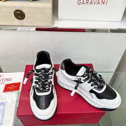 Женские кожаные кроссовки Valentino Garavani 2023-2024 белые с черным