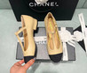 Женские кожаные балетки Chanel Mary Janes 2022-2023 бежевые с черным