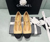 Женские кожаные балетки Chanel Mary Janes 2022-2023 бежевые с черным