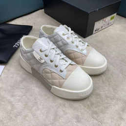 Женские текстильные кроссовки Chanel 2022-2023 белые с бежевым