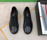 Мужские кожаные кеды Prada 2022-2023 черные