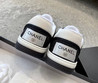 Женские текстильные кроссовки Chanel 2022-2023 черные с белым