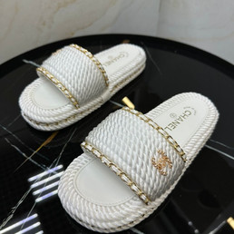 Женские плетёные шлепанцы Chanel 2022-2023 белые
