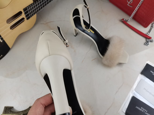 Женские кожаные туфли Saint Laurent 2023-2024 белые с мехом