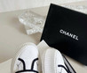 Женские текстильные кроссовки Chanel 2023-2024 белые с черным