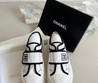 Женские текстильные кроссовки Chanel 2023-2024 белые с черным