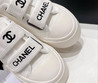 Женские текстильные кроссовки Chanel 2023-2024 белые с логотипом