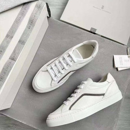 Женские кожаные кроссовки Brunello Cucinelli 2023-2024 белые с полосой