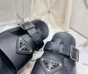 Женские кожаные шлепанцы Prada 2023-2024 черные