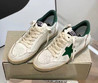 Женские комбинированные кроссовки Golden Goose 2023-2024 белые с зеленой звездой