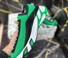 Мужские текстильные кроссовки Dolce & Gabbana 2023-2024 зеленые c логотипом на черном фоне