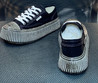 Женские текстильные кроссовки Chanel 2023-2024 черные с серой подошвой