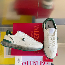Женские кожаные кроссовки Valentino 2023-2024 белые с зеленым