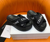 Женские кожаные шлепанцы Celine 2023-2024 черные с надписью бренда