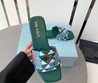 Женские текстильные шлепанцы Prada 2023-2024 зеленые с цветами