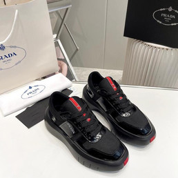 Мужские кожаные кроссовки Prada 2023-2024 черные с красной полосой и черными текстильными вставками