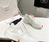 Мужские кожаные кроссовки  Prada 2023-2024  белые с красной полосой и белыми текстильными вставками