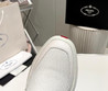 Мужские текстильные кроссовки  Prada 2023-2024  белые с красной полосой