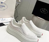 Мужские текстильные кроссовки  Prada 2023-2024  белые с красной полосой