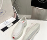 Мужские текстильные кроссовки  Prada 2023-2024  белые с красной полосой