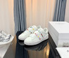 Женские кожаные кроссовки Valentino 2023-2024 белые с цветным украшением сбоку