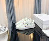 Женские кожаные кроссовки Valentino 2023-2024 белые с цветным украшением сбоку