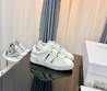 Женские кожаные кроссовки Valentino 2023-2024 белые с цветным украшением сбоку