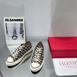 Женские текстильные кеды Valentino 2023-2024 белые с коричневым