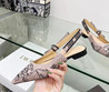 Женские текстильные туфли Christian Dior 2023-2024 бежевые с черным рисунком цветов