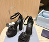 Женские текстильные туфли Prada 2023-2024 черные со стразами