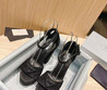 Женские текстильные туфли Prada 2023-2024 черные со стразами