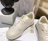 Женские кожаные кроссовки Christian Dior 2023-2024 кремовые