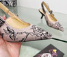 Женские текстильные туфли Christian Dior 2023-2024 розовые с черным цветком