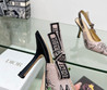 Женские текстильные туфли Christian Dior 2023-2024 розовые с черным цветком на каблуке