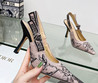 Женские текстильные туфли Christian Dior 2023-2024 розовые с черным цветком на каблуке