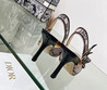 Женские текстильные туфли Christian Dior 2023-2024 розовые с черным цветком на каблуке