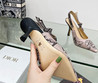 Женские текстильные туфли Christian Dior 2023-2024 розовые с черным цветком на каблуке