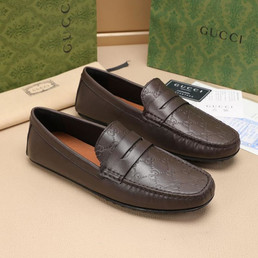 Мужские кожаные мокасины Gucci 2023-2024 коричневые