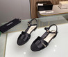 Женские кожаные босоножки Chanel 2023-2024 черные с текстильным носом