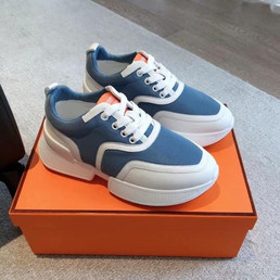 Женские текстильные кроссовки Hermes 2023-2024 голубые с белым