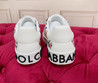 Женские кожаные кроссовки Dolce & Gabbana 2023-2024 белые с цветным принтом