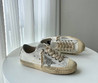 Женские кожаные кроссовки Golden Goose 2023-2024 бежевые с серебряной звездой